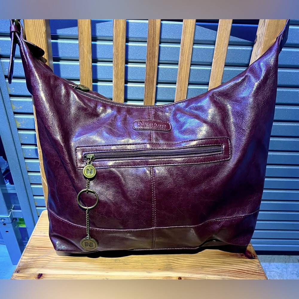 Nygard Collection Purse, Rich Maroon in colour and New without Tags (NWOT).
